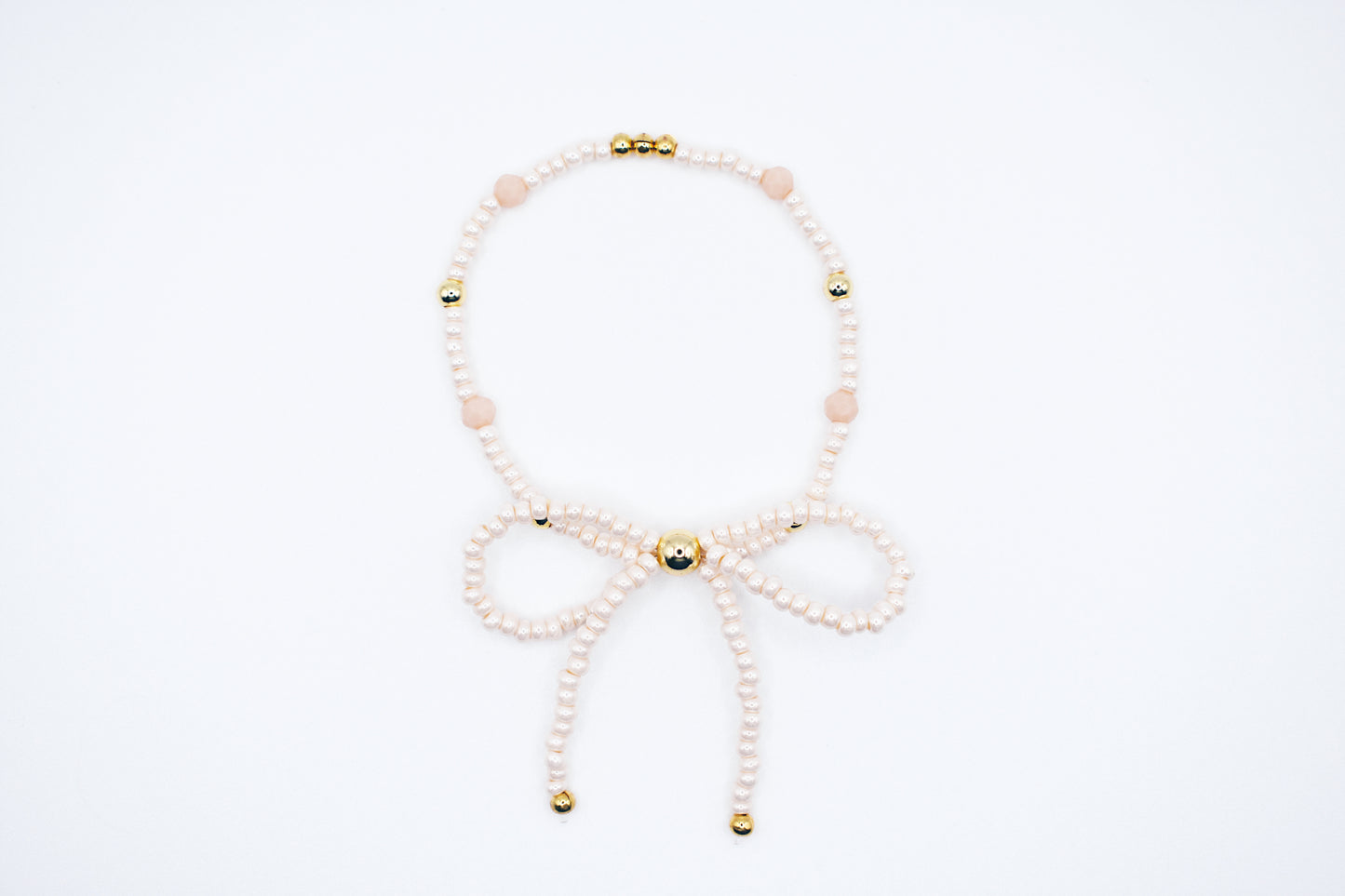 Light pink bow bracelet