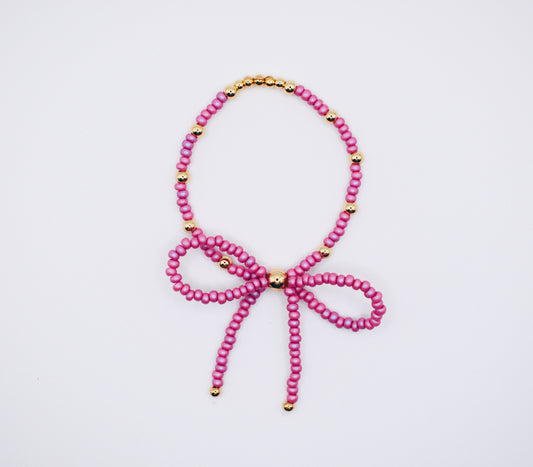 Fuchsia & gold bow bracelet